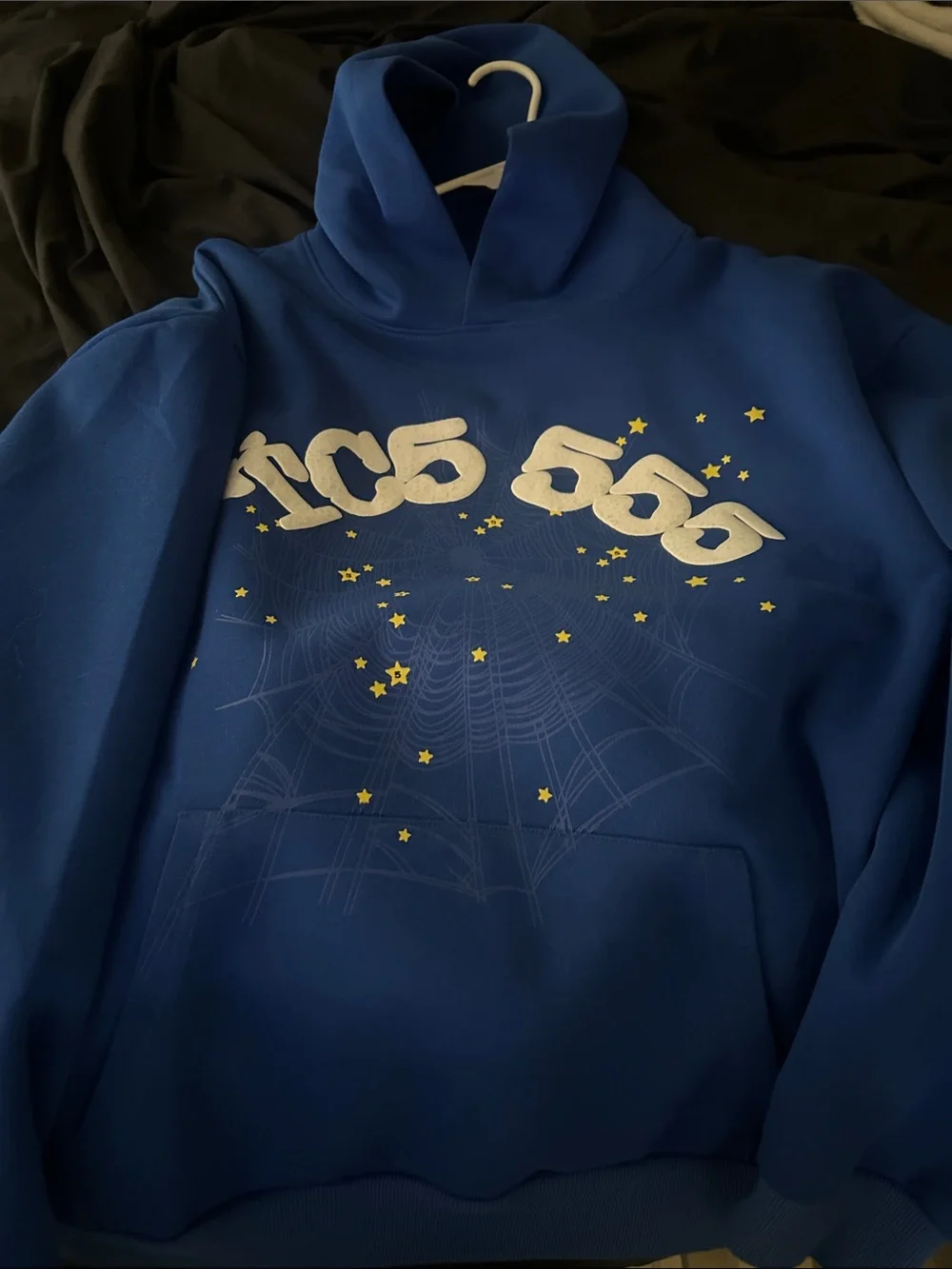 Blue Graphic Hoodie with White Logo and Yellow Star Details